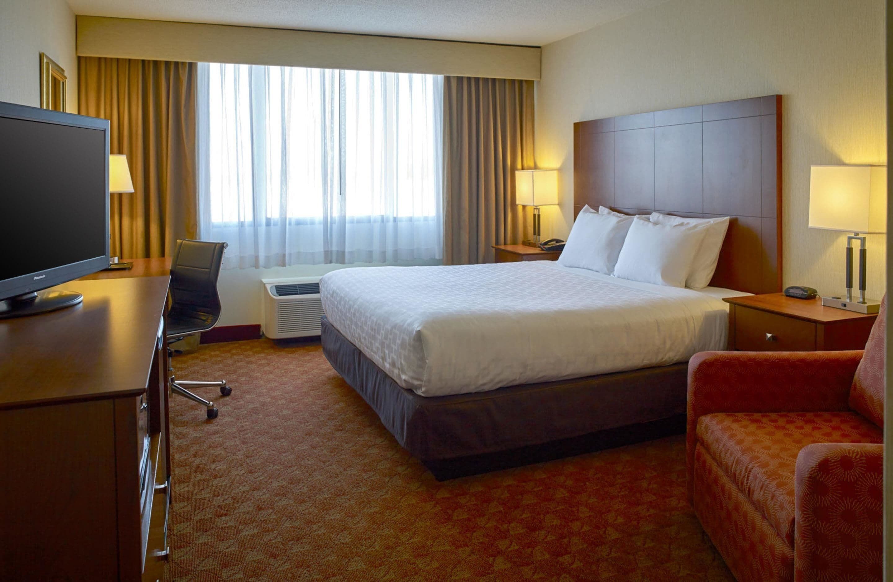 Pillowtop beds, desk, laptop workspace, blackout drapes
