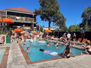 Outdoor pool, a heated pool, open 9:00 AM to 10:00 PM, free pool cabanas