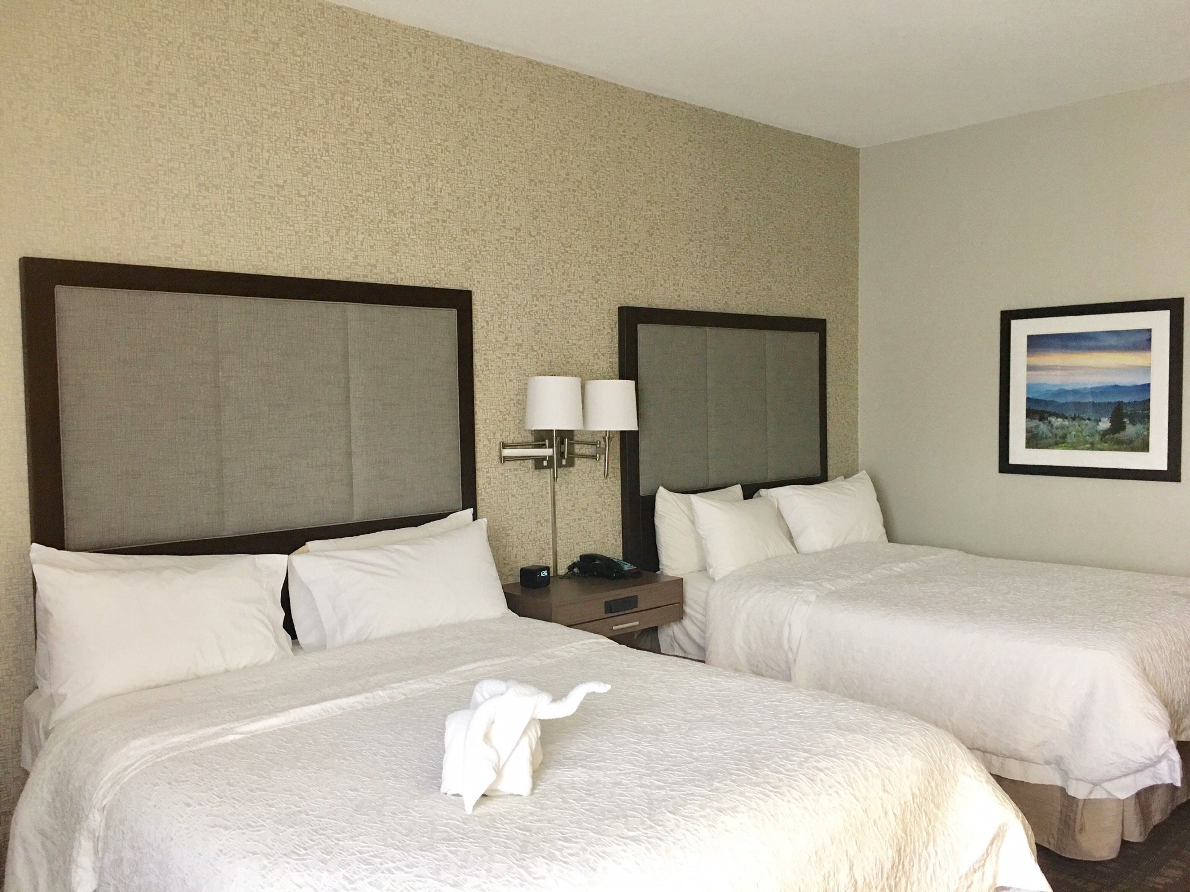 desk, laptop workspace, blackout curtains, iron/ironing board