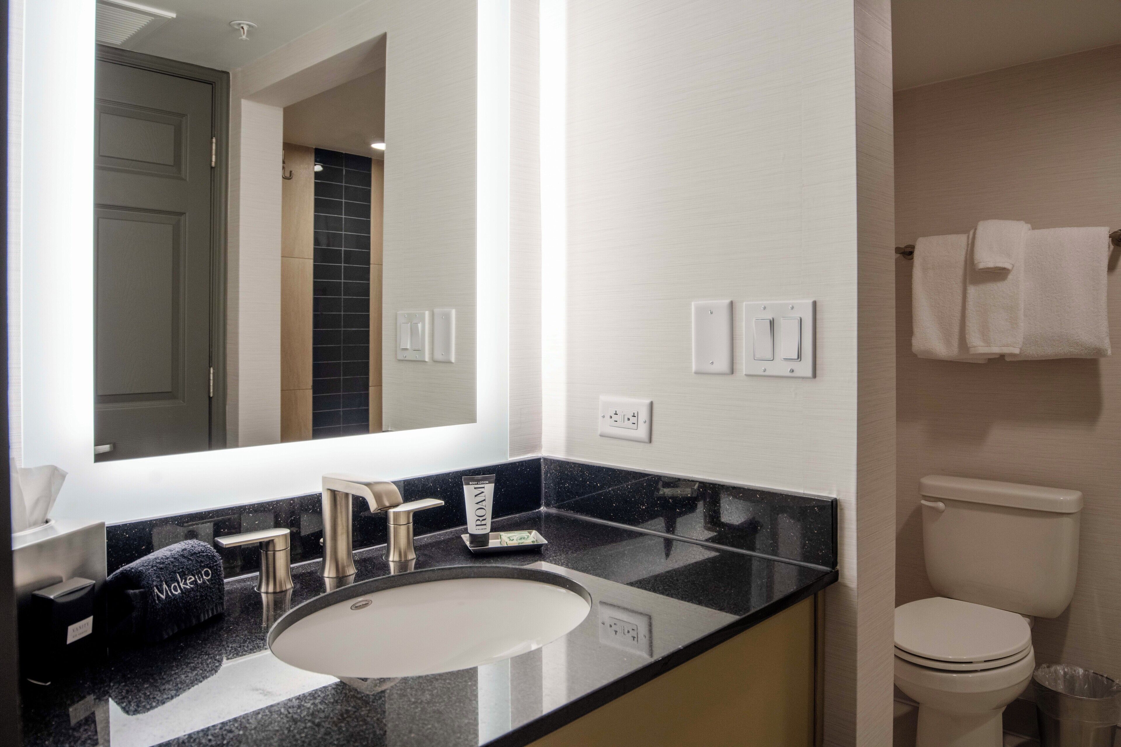 shower, designer toiletries, hair dryer, bathrobes