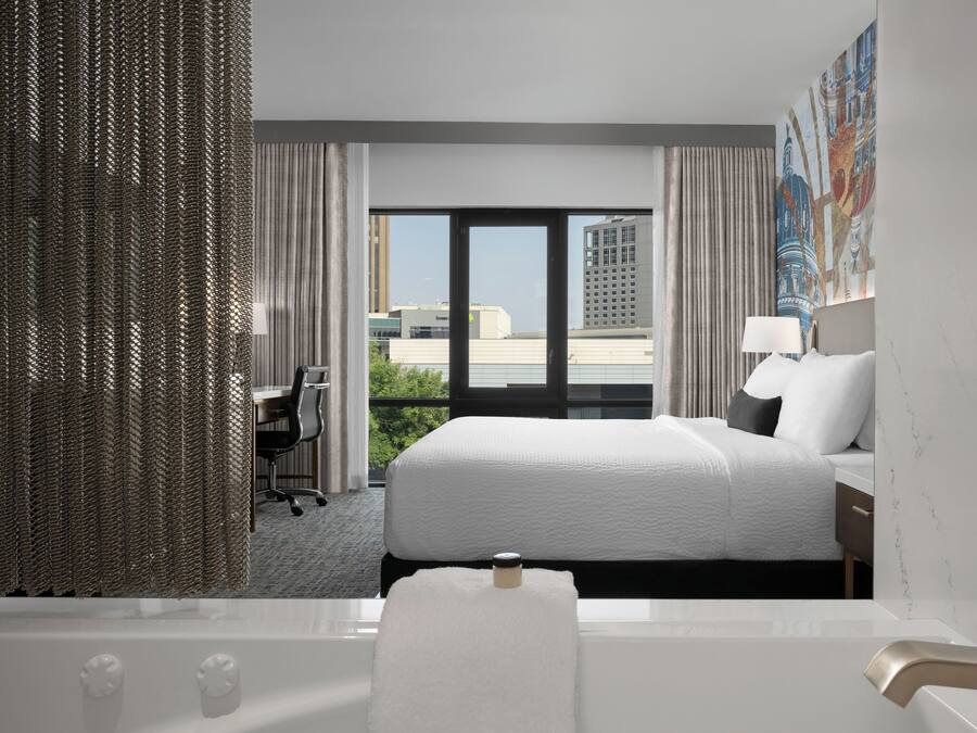 Premium bedding, down comforters, pillowtop beds, in-room safe