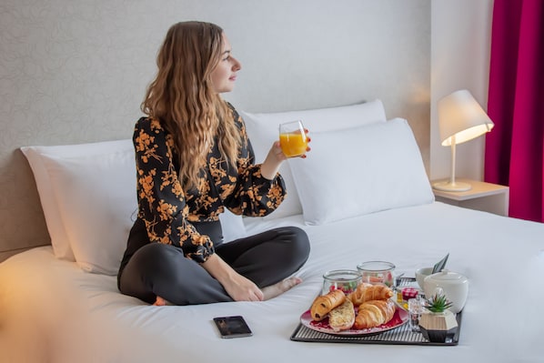 Premium bedding, pillowtop beds, minibar, in-room safe