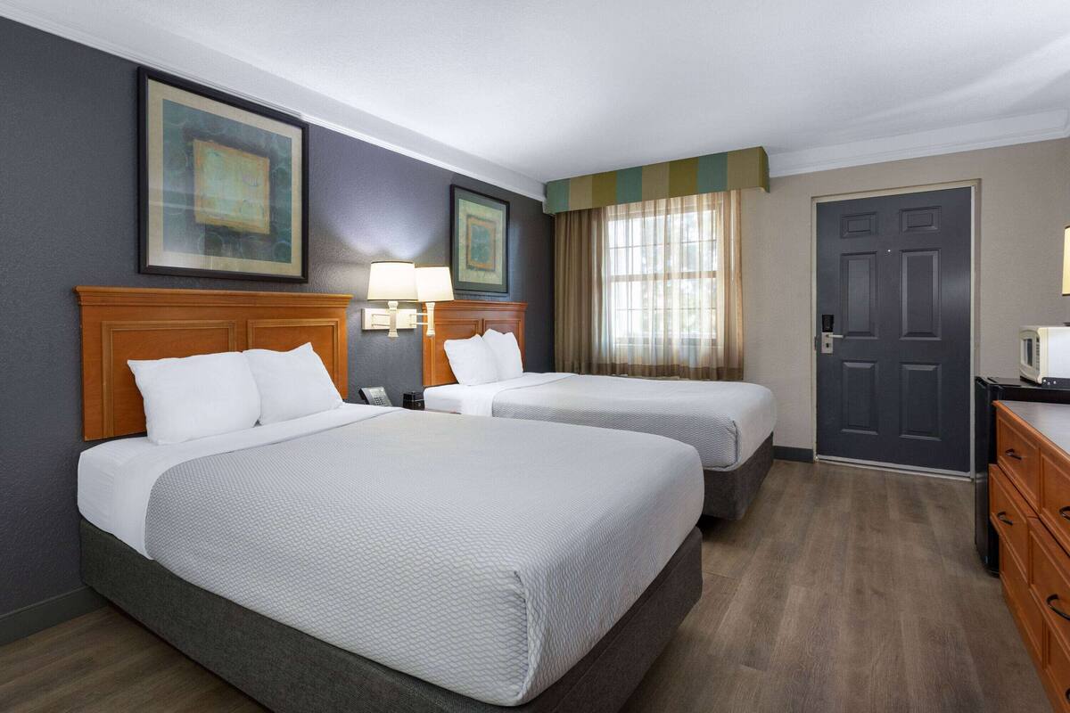 premium bedding, desk, laptop workspace, iron/ironing board