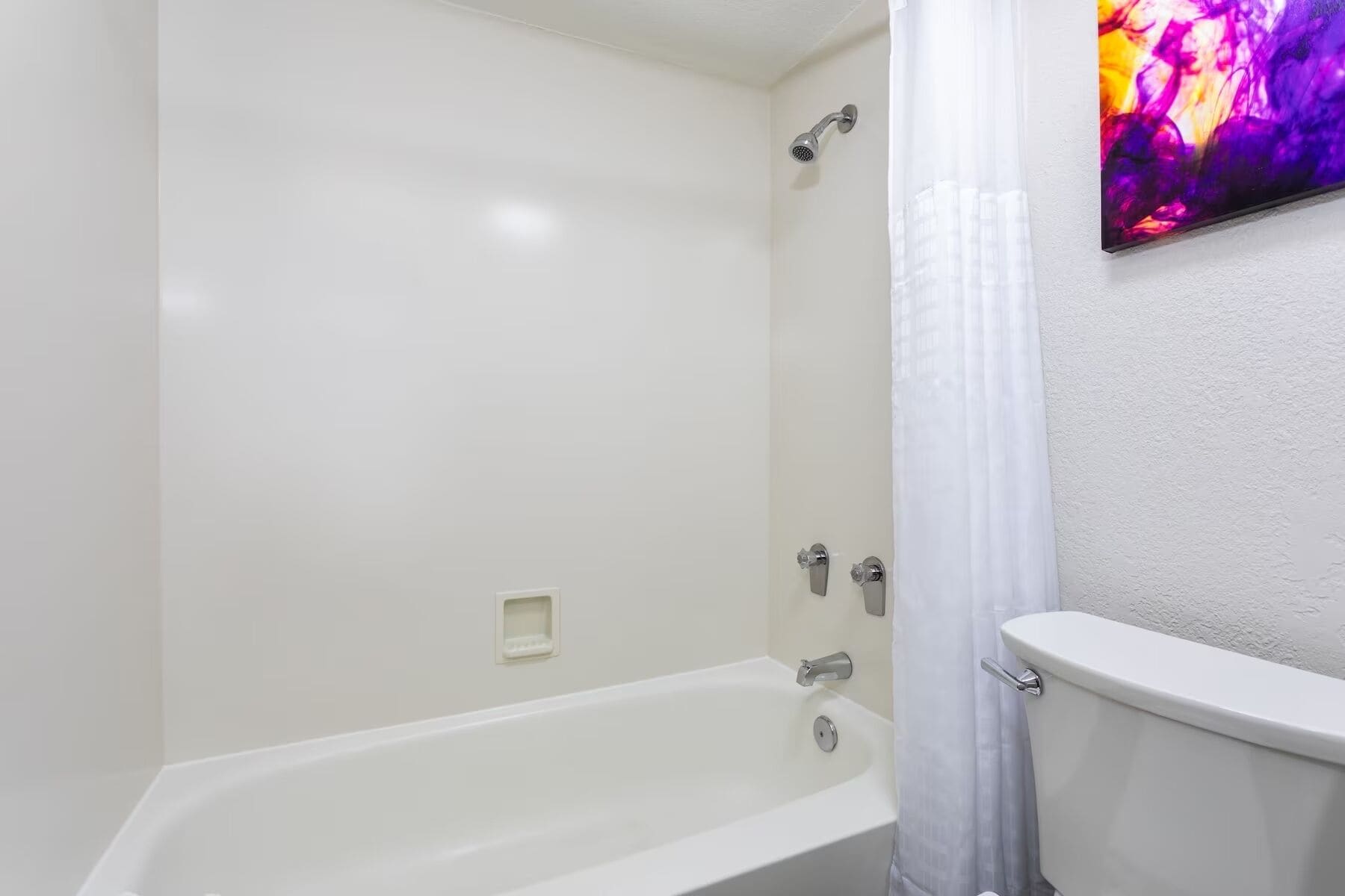 combined shower/bathtub, free toiletries, hair dryer, towels