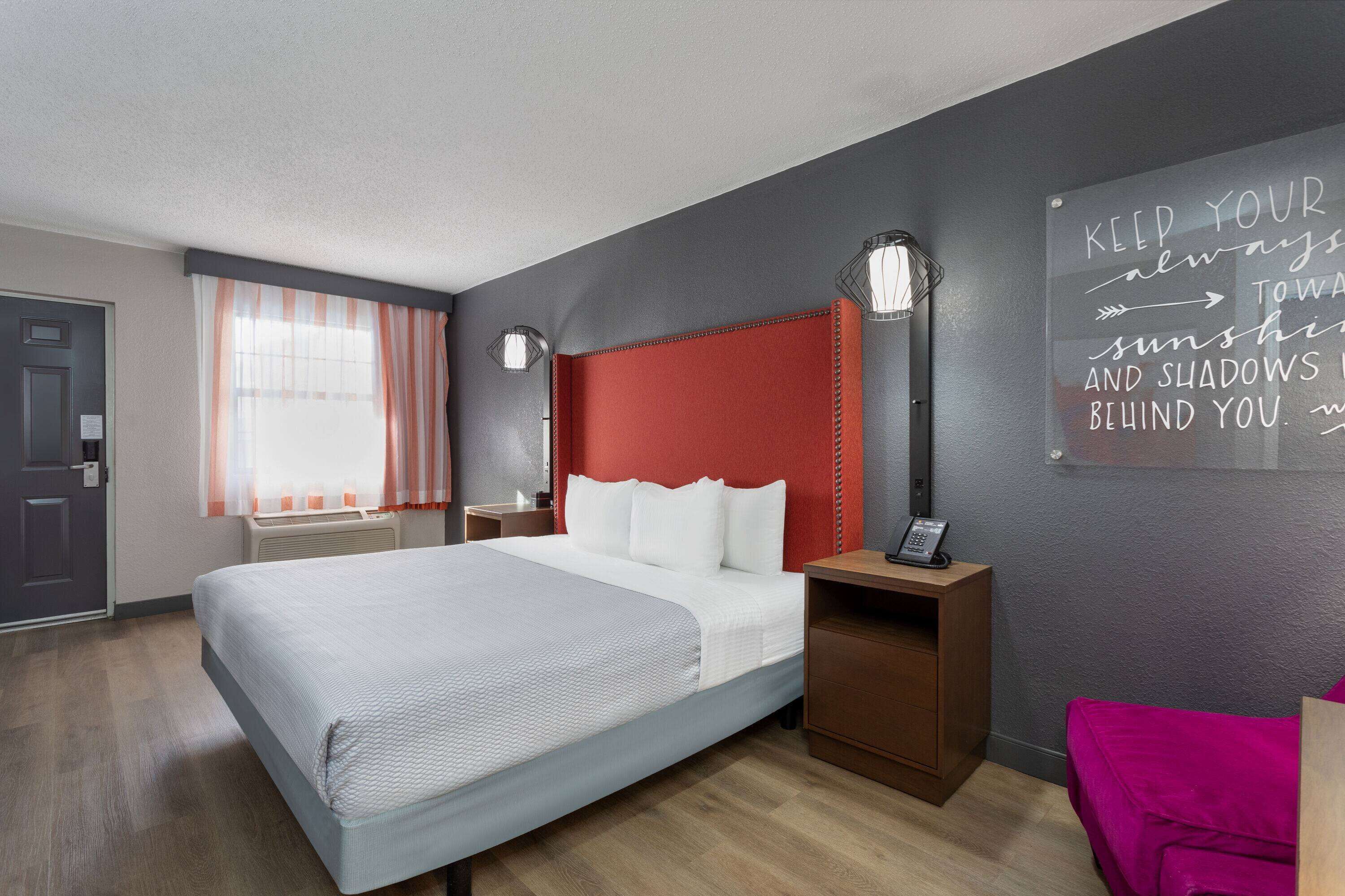 premium bedding, desk, laptop workspace, iron/ironing board