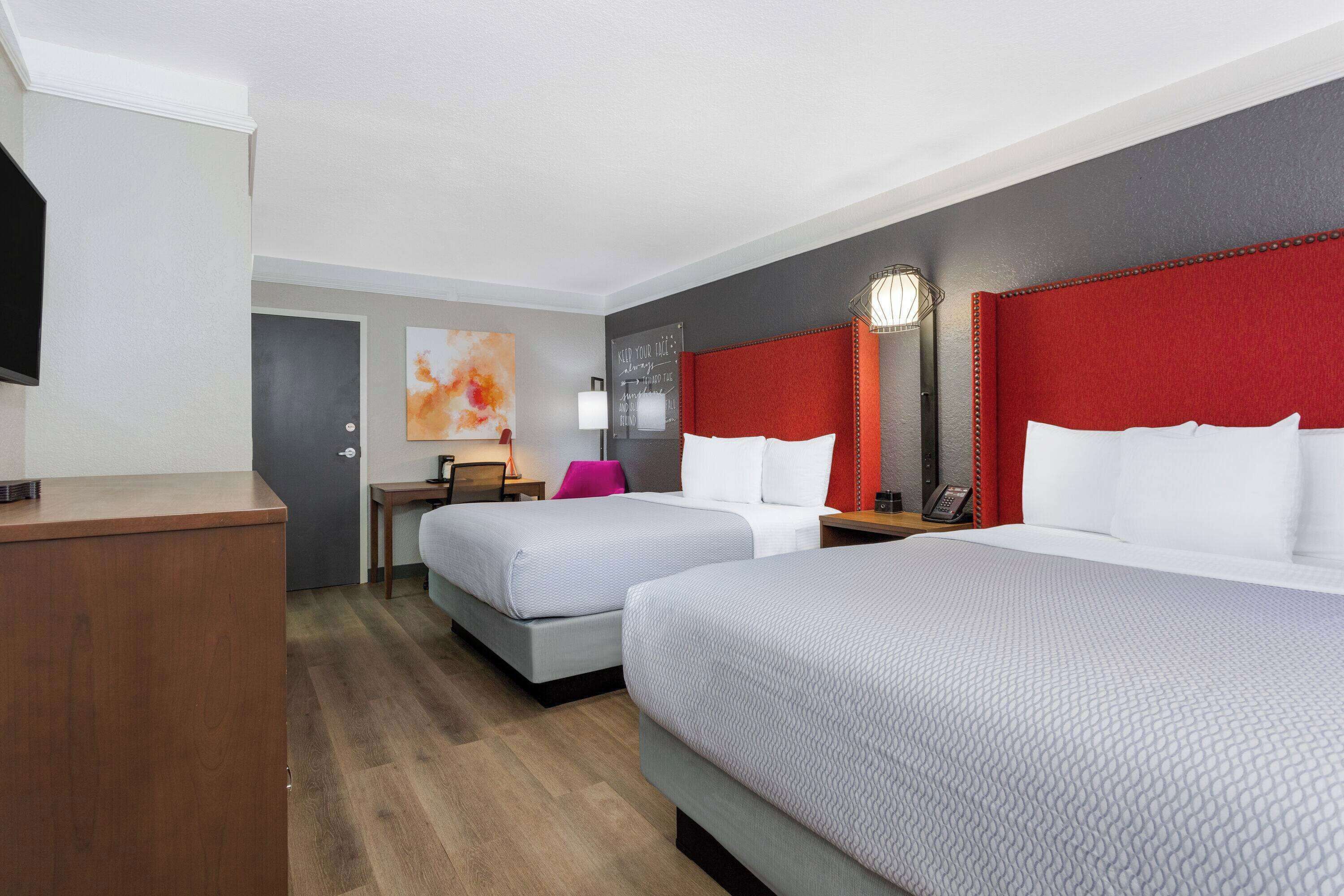 premium bedding, desk, laptop workspace, iron/ironing board