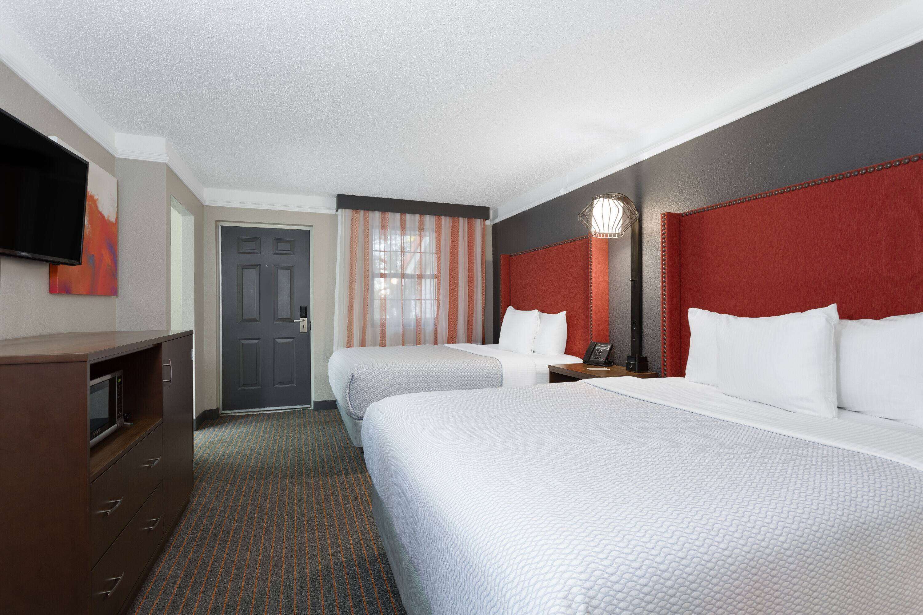 premium bedding, desk, laptop workspace, iron/ironing board