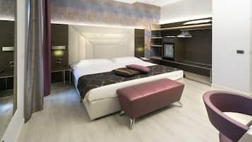 Chambre Deluxe | Draps italiens Frette, couette en duvet d'oie, minibar