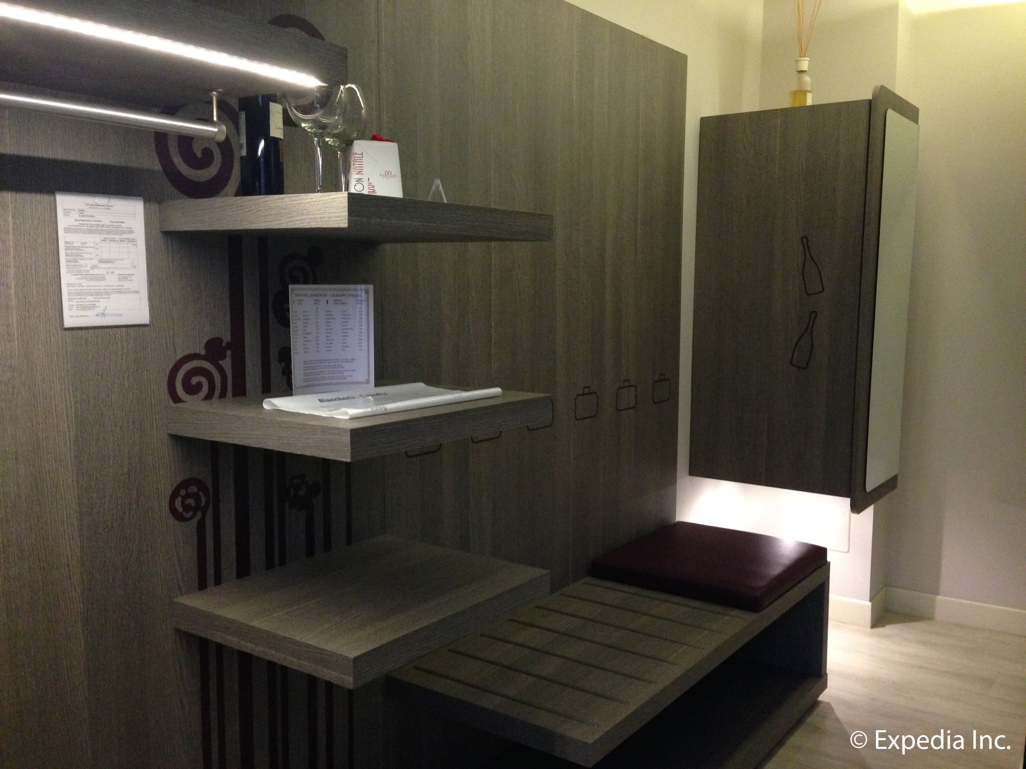 Deluxe Room | Frette Italian sheets, down comforters, minibar, in-room safe