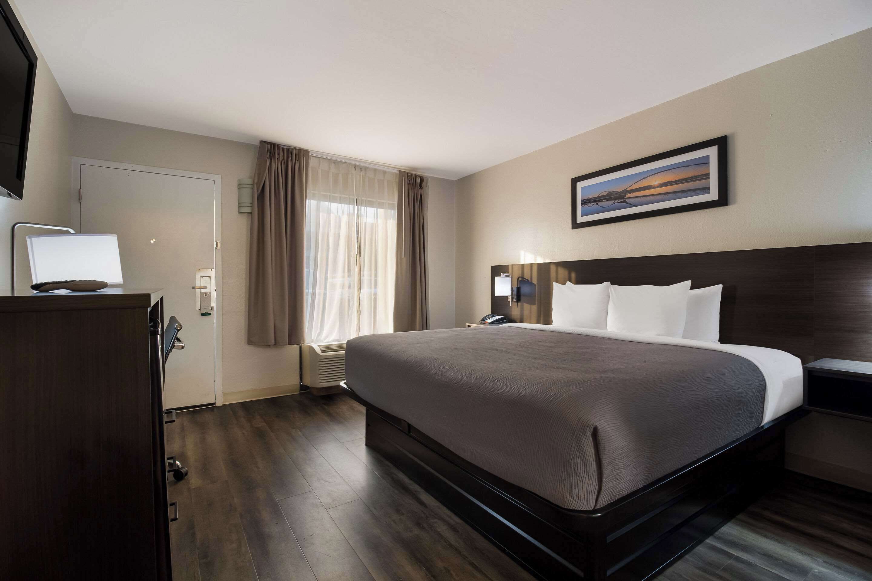 room, 1 king bed, accessible, non smoking | in-room safe, desk, laptop workspace, iron/ironing board