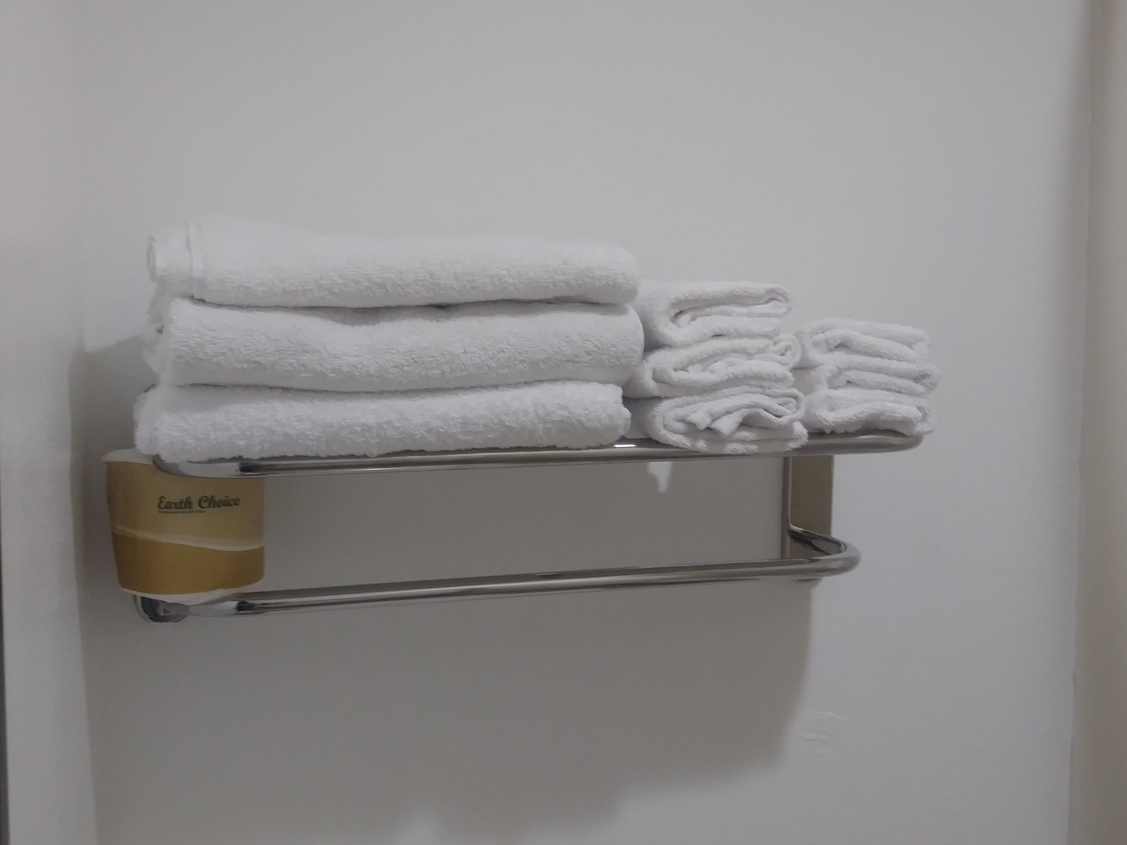 single room, 1 king bed | bathroom | eco-friendly toiletries, hair dryer, towels