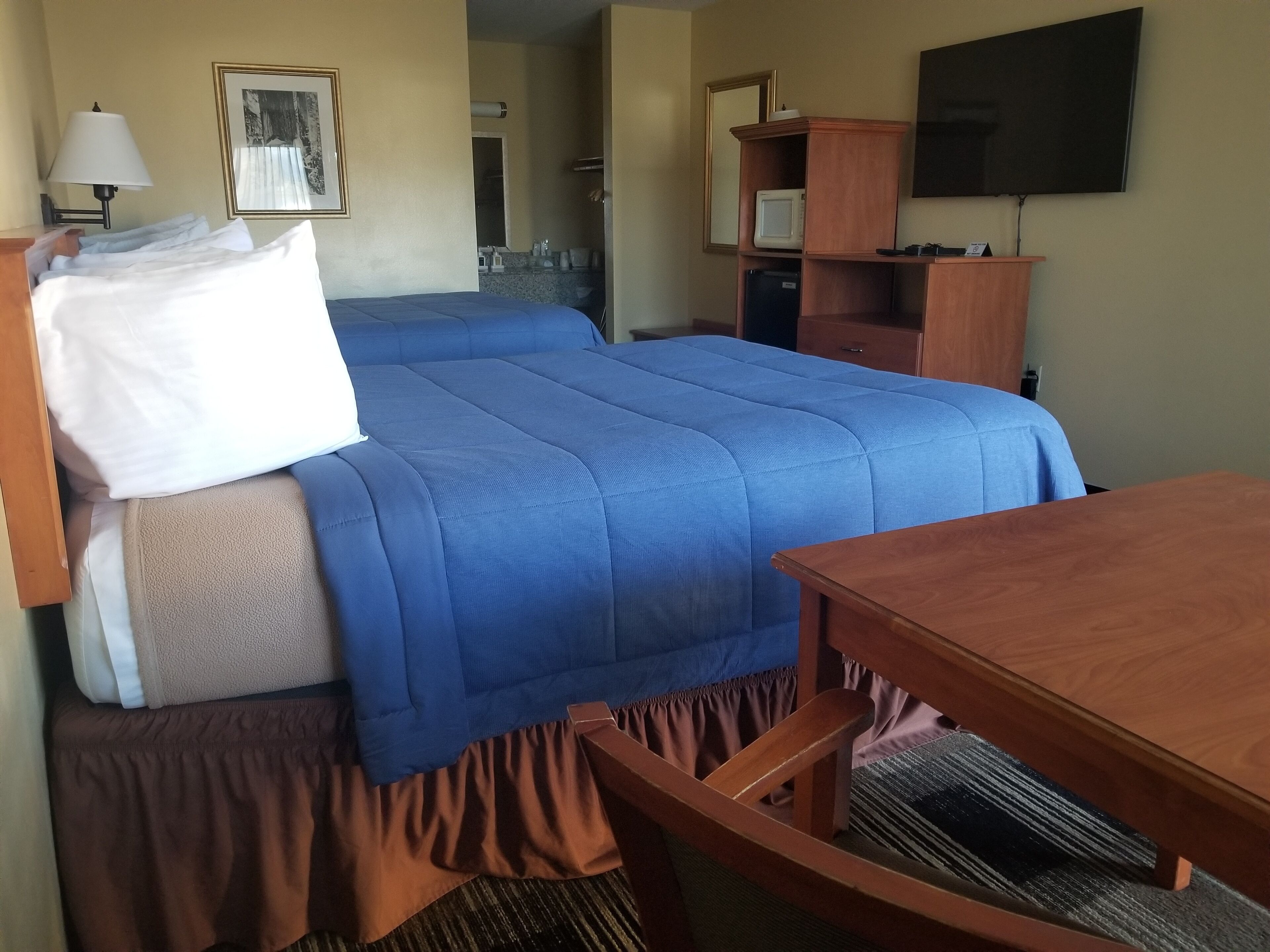 room, 2 queen beds | individually furnished, laptop workspace, blackout curtains