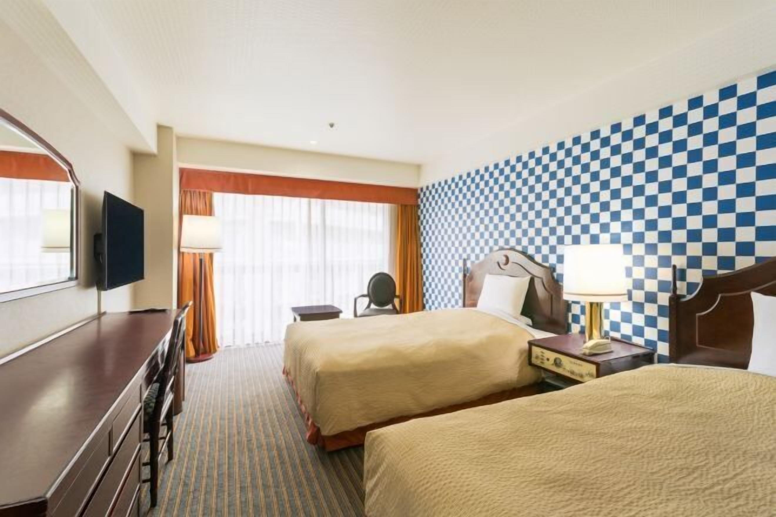 Premium bedding, down duvets, in-room safe, desk