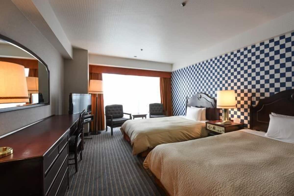 Premium bedding, down duvets, in-room safe, desk
