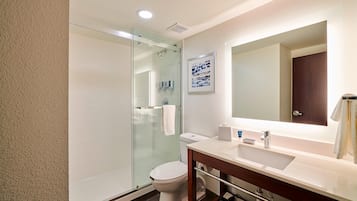 Designer toiletries, hair dryer, towels