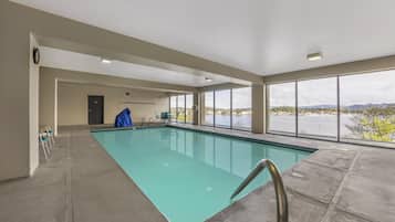 Indoor pool, open 8:00 AM to 10:00 PM, pool loungers