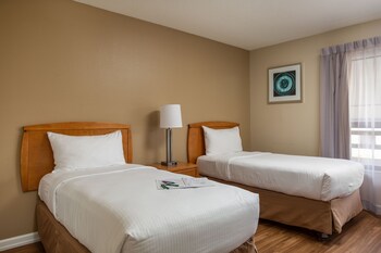 In-room safe, iron/ironing board, free WiFi, bed sheets at Orbit One Vacation Villas