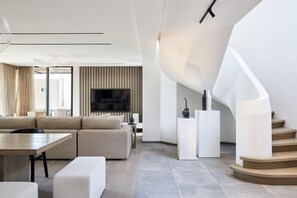 LUX* Grand Beach Pool Villa | Living area | TV
