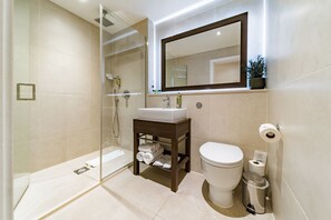 Deluxe Double Room (Windowless) | Bathroom | Free toiletries, hair dryer, towels, soap