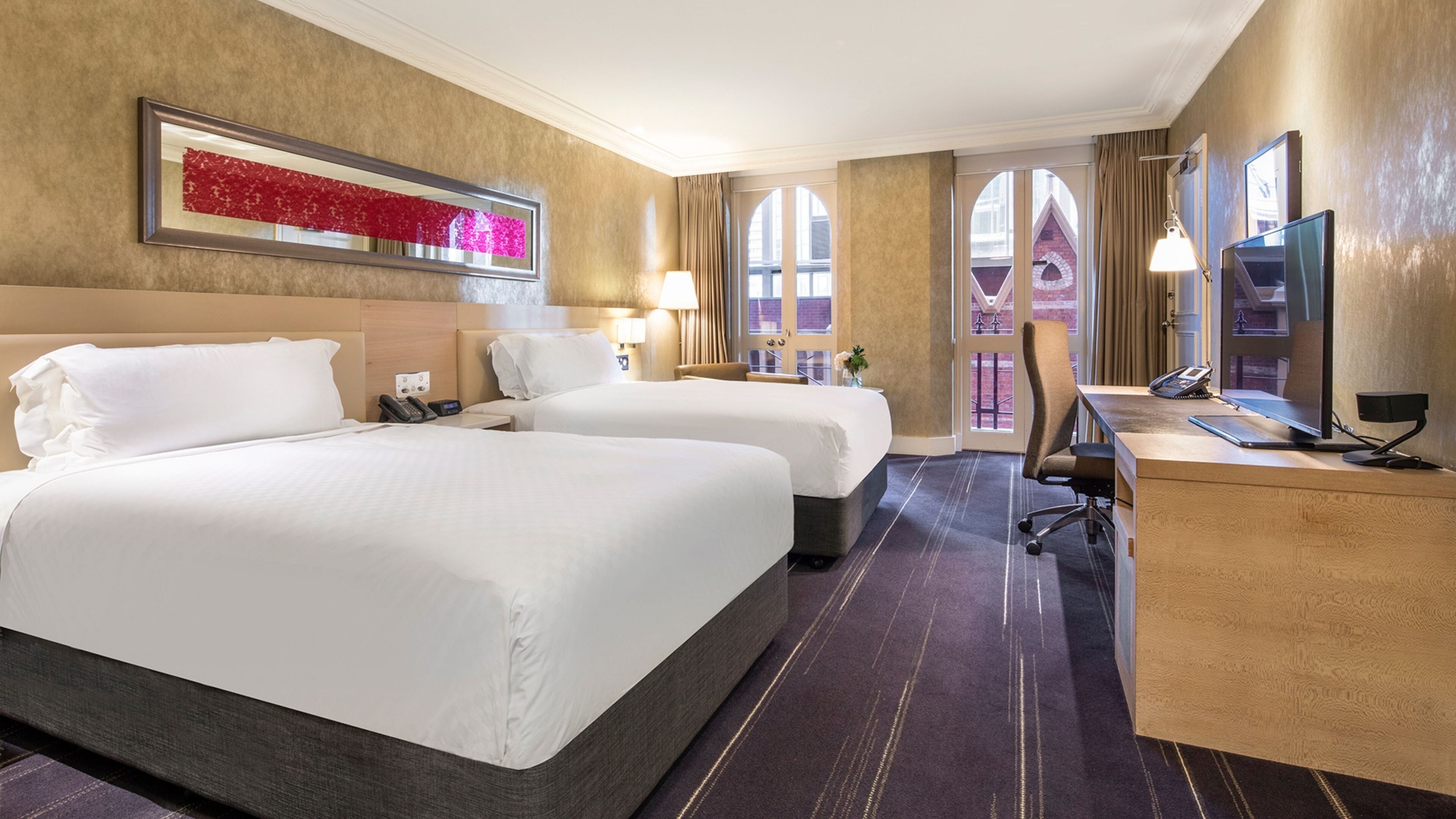 Premium bedding, down comforters, minibar, in-room safe