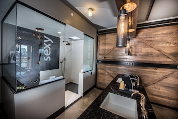 Shower, rainfall showerhead, designer toiletries, hair dryer at FOUNDRE Phoenix
