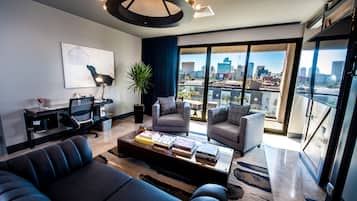 Suite, 1 Bedroom | Living area | 42-inch TV with cable channels