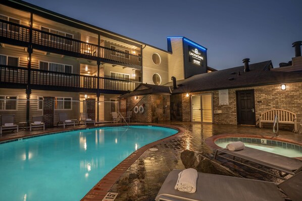 Outdoor pool, open 9:00 AM to 10:00 PM, sun loungers