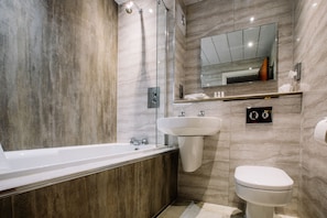 Designer toiletries, hair dryer, towels, soap
