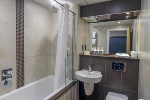 Designer toiletries, hair dryer, towels, soap