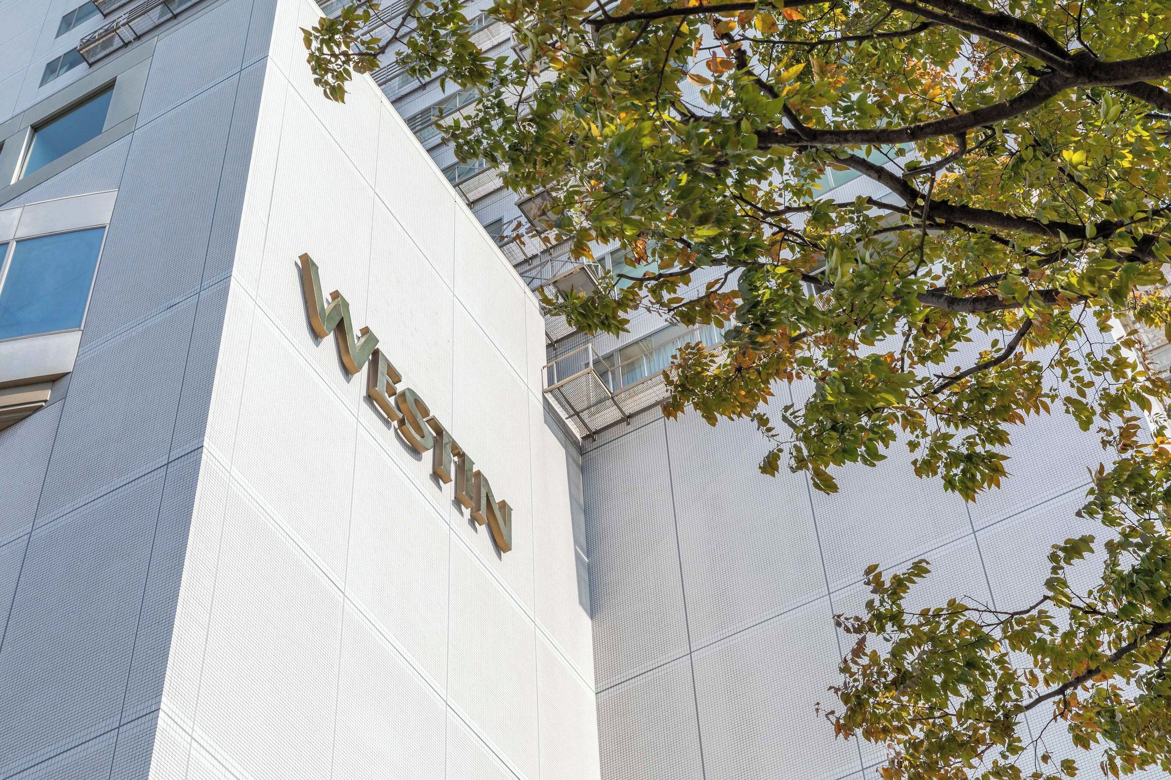 A building with a large sign reading "WESTIN".