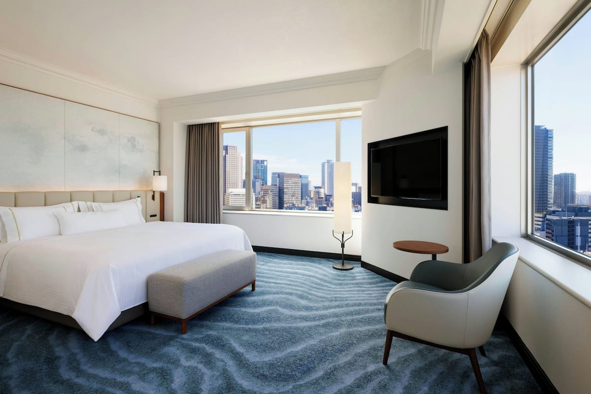Suite, 1 King Bed, Corner | Premium bedding, down comforters, minibar, in-room safe