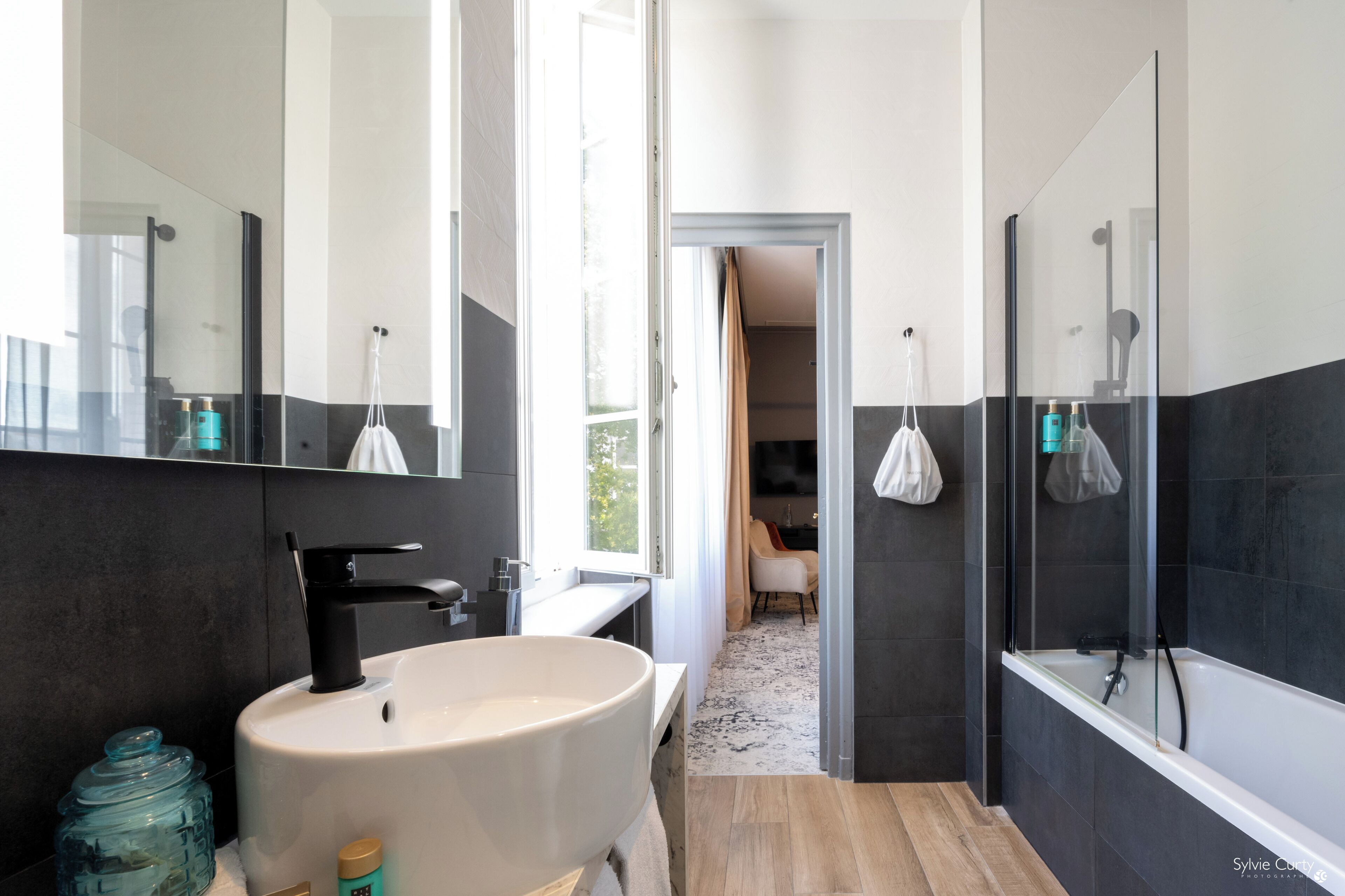 deluxe room | bathroom | eco-friendly toiletries, hair dryer, towels, soap