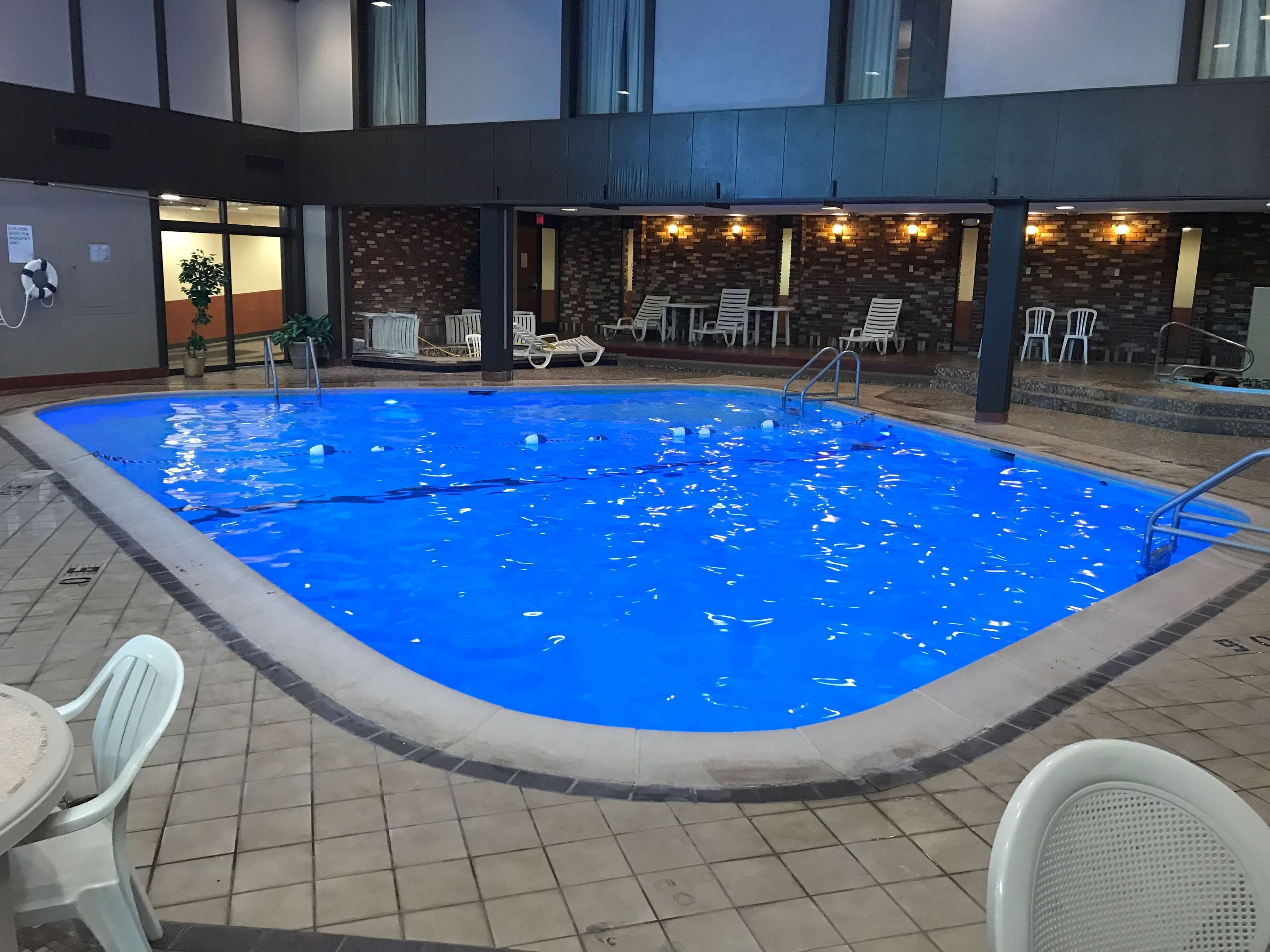 Indoor pool, a heated pool, open 6:00 AM to 10:00 PM, sun loungers