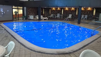 Indoor pool, a heated pool, open 6:00 AM to 10:00 PM, sun loungers