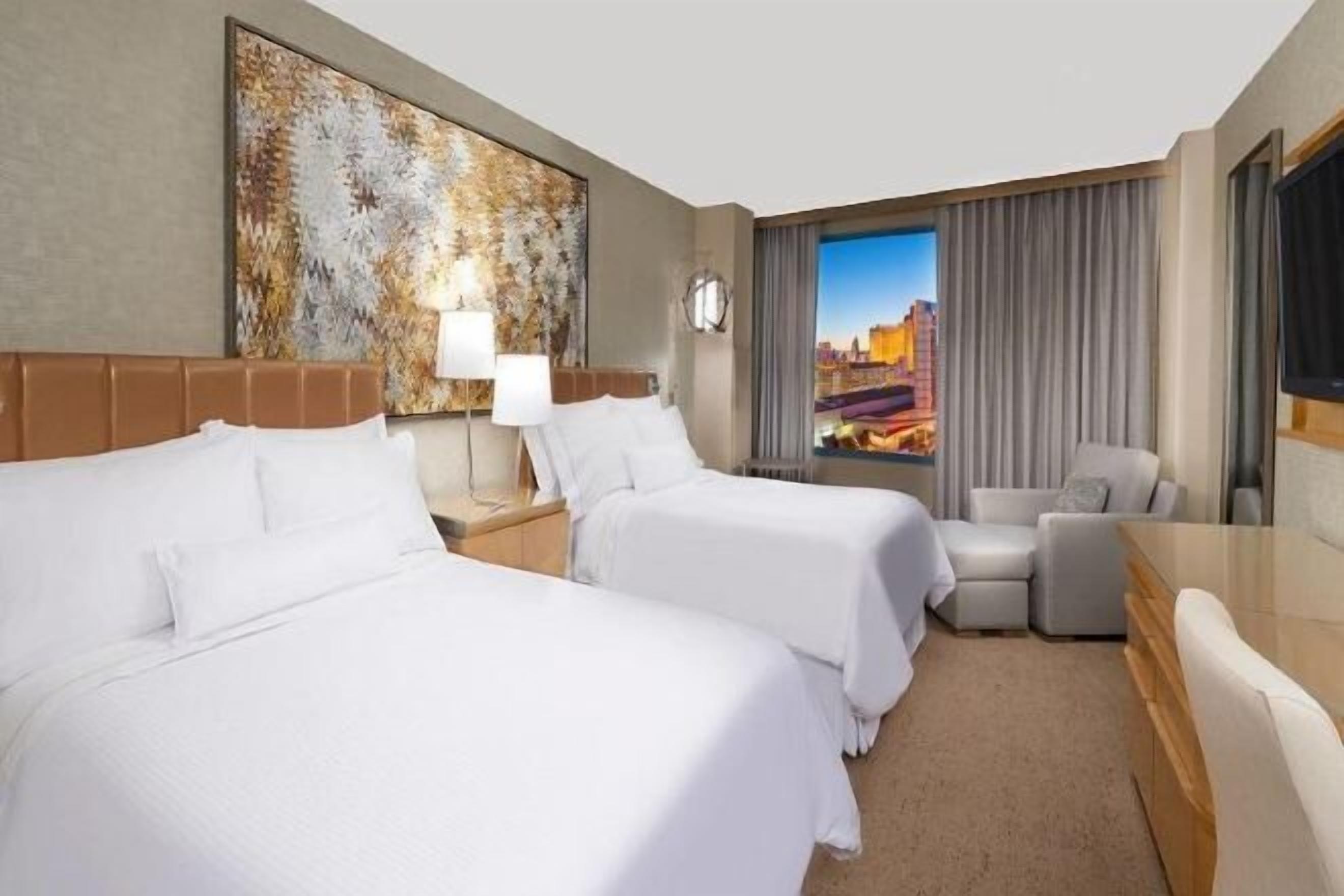 Premium bedding, down comforters, pillowtop beds, minibar