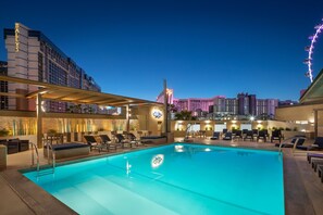 Outdoor pool, open 8:00 AM to 8:00 PM, cabanas (surcharge)