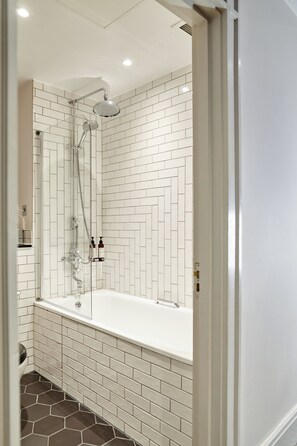 Combined shower/tub, eco-friendly toiletries, hair dryer, bathrobes