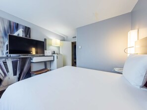 Habitación clásica, 1 cama matrimonial | Ropa de cama de alta calidad y minibar 