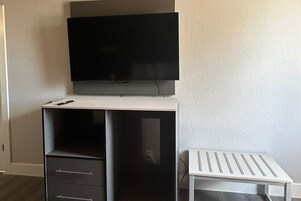 Deluxe Room, 1 King Bed, Non Smoking | Desk, laptop workspace, iron/ironing board, rollaway beds