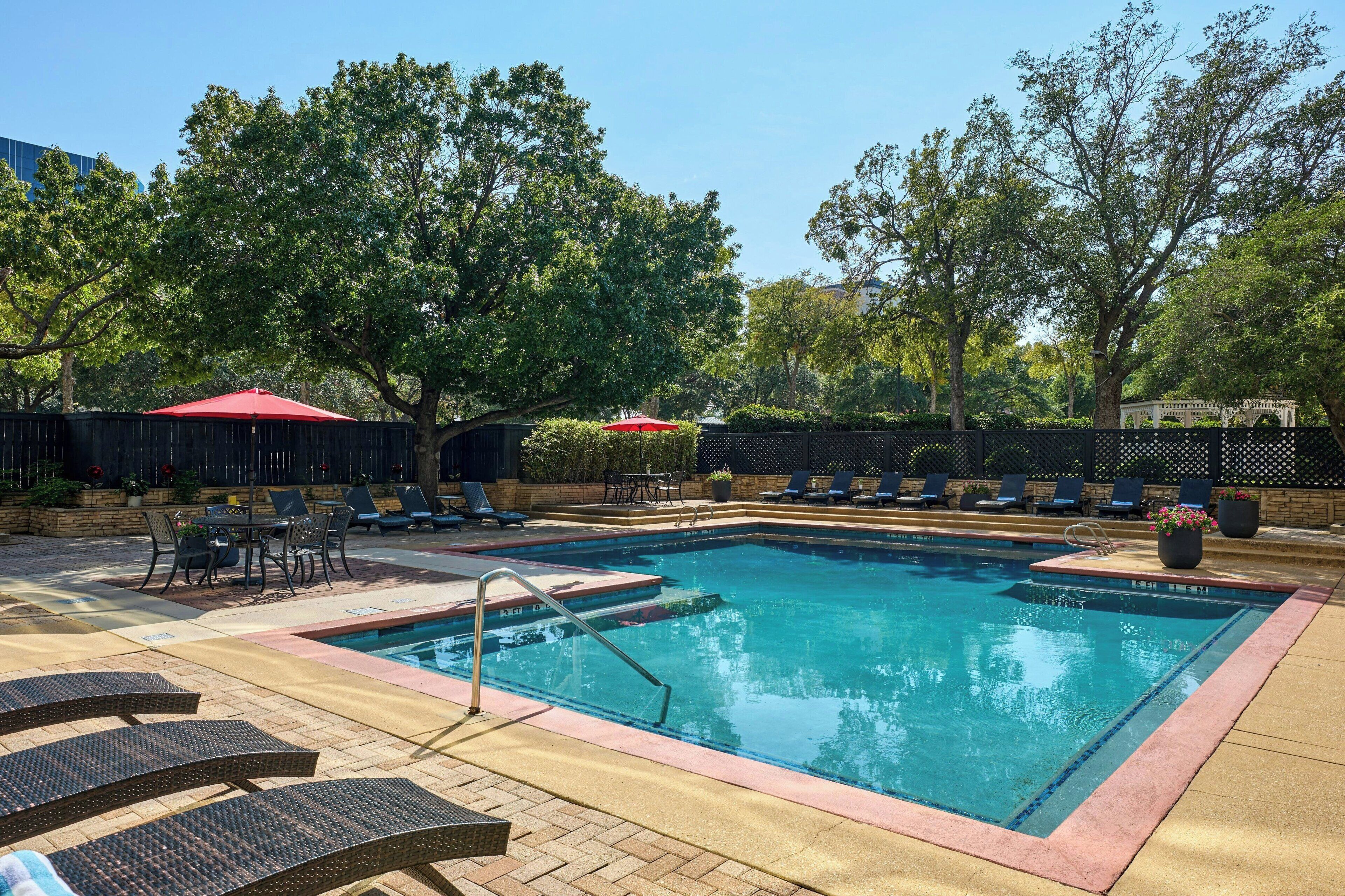 Outdoor pool, open 7:00 AM to 10:00 PM, pool umbrellas, pool loungers