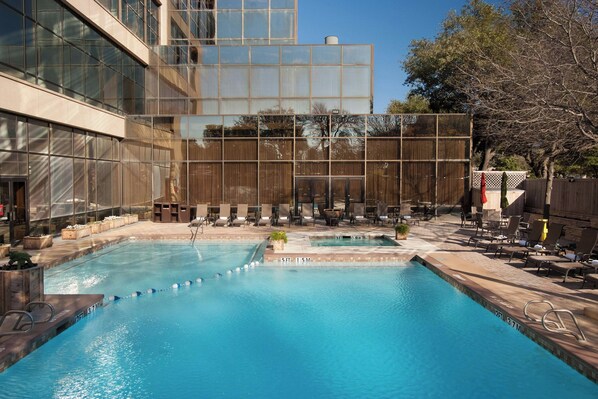 Outdoor pool, open 7:00 AM to 10:00 PM, pool umbrellas, sun loungers