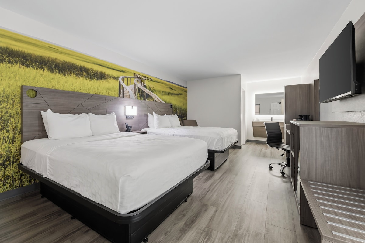 Room, 2 Queen Beds, Non Smoking (Upgrade) | Desk, laptop workspace, blackout curtains, iron/ironing board