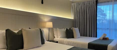 Twin Premium Room | Pillowtop beds, desk, laptop workspace, blackout drapes