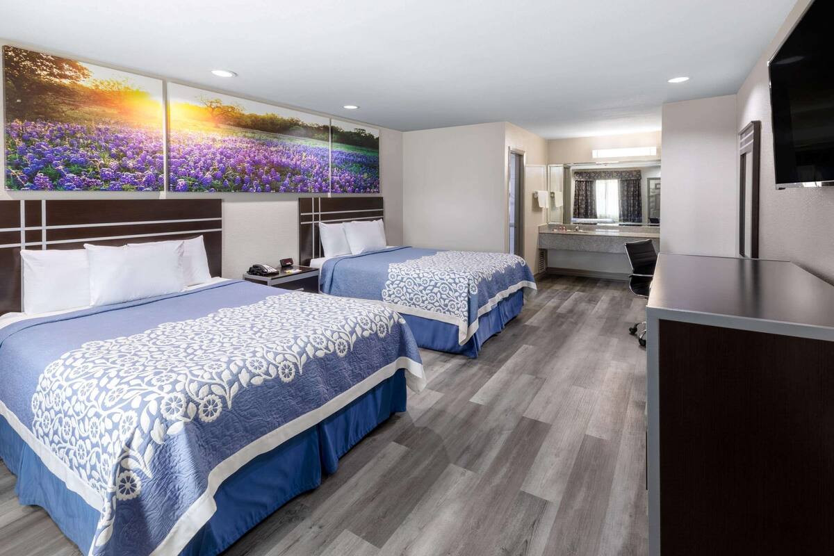 Pillowtop beds, desk, blackout drapes, iron/ironing board