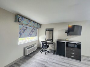 Suite, 1 King Bed, Non Smoking (One-Bedroom) | Pillowtop beds, desk, blackout drapes, iron/ironing board