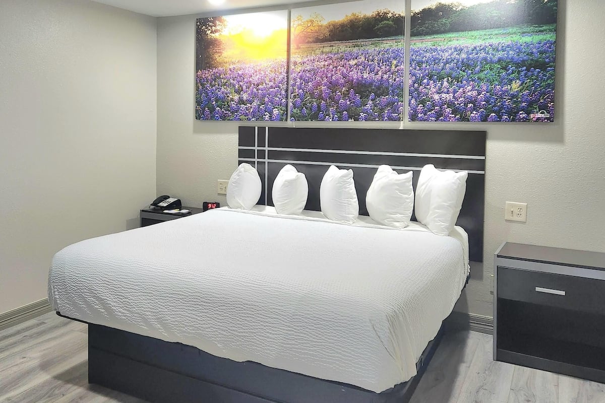 Pillowtop beds, desk, blackout drapes, iron/ironing board