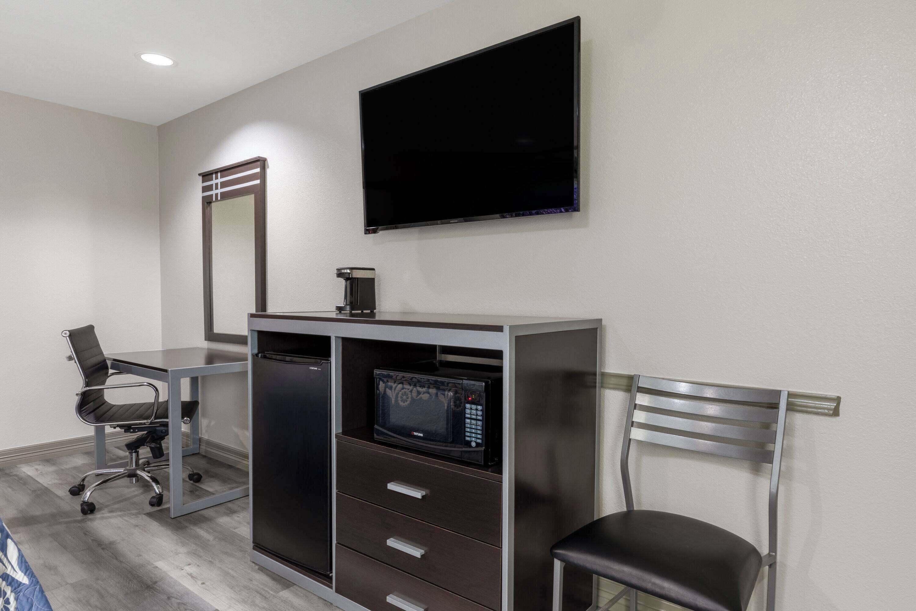 Pillow-top beds, desk, blackout curtains, iron/ironing board