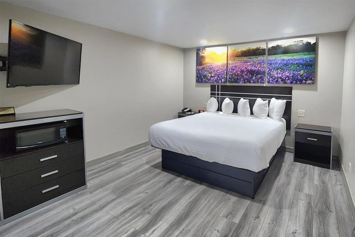 Pillow-top beds, desk, blackout curtains, iron/ironing board