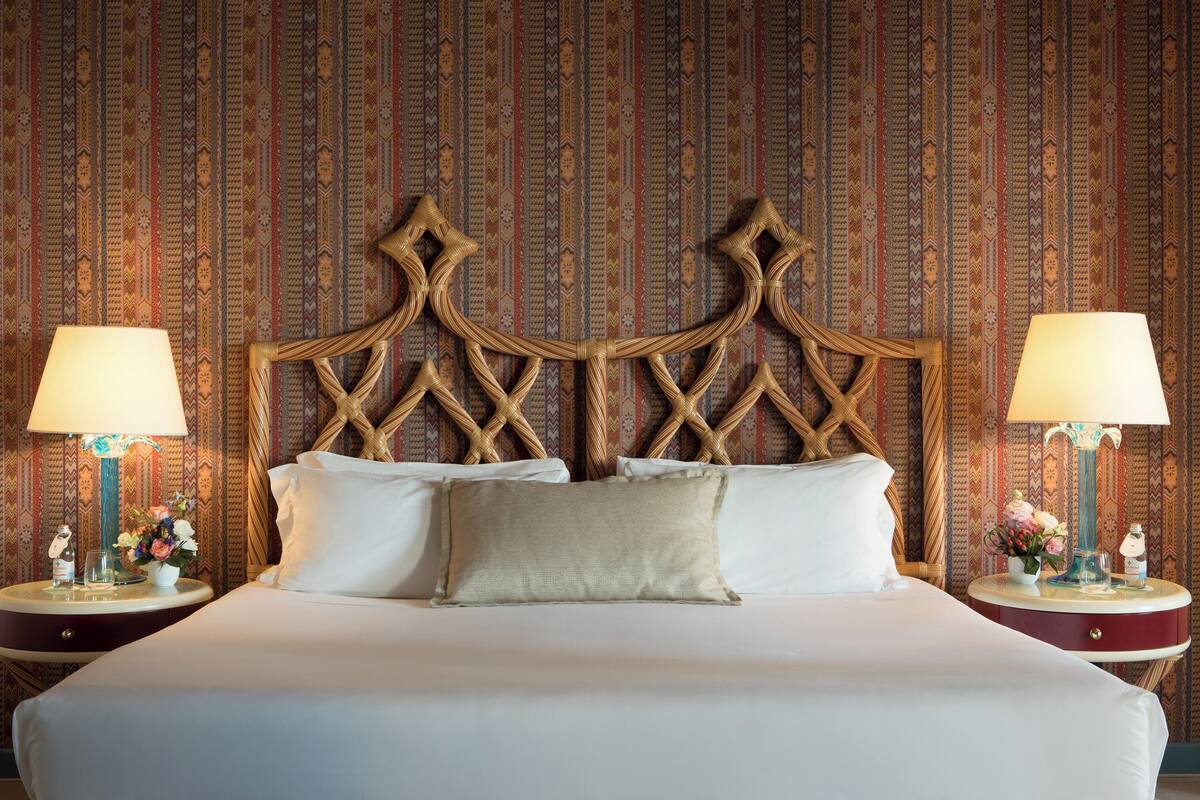 Premium bedding, down comforters, minibar, in-room safe
