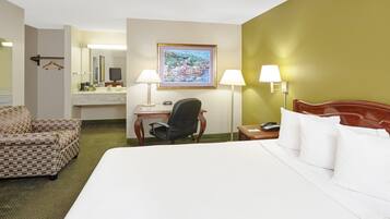 Standard Room, 1 King Bed, Smoking | Pillowtop beds, desk, blackout drapes, iron/ironing board